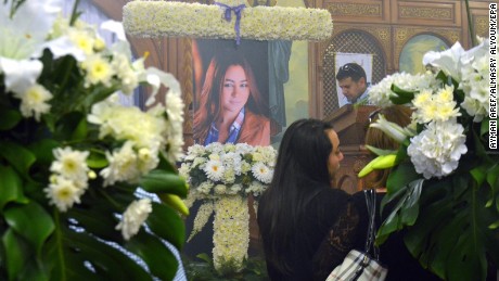 A portrait of Yara Hani Faraq Tawfiq  is seen during a memorial service.