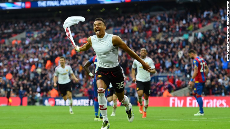 Jesse Lingard celebrates scoring the winning goal in the 2016 FA Cup final.