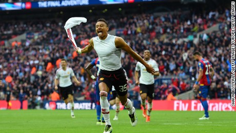 Jesse Lingard celebrates scoring the winning goal in the 2016 FA Cup final.