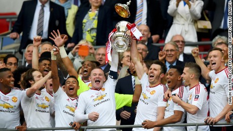 Manchester United players celebrate winning the 2016 FA Cup final.