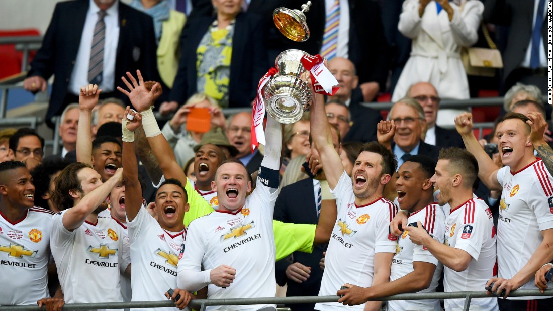 United&#39;s players celebrate winning the 2016 FA Cup after beating Crystal Palace 2-1 in the final. It was the club&#39;s first triumph in the competition since 2004.