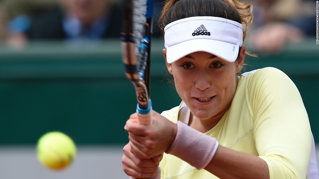 Garbine Muguruza, the 2015 Wimbledon finalist, rallied to defeat Anna Karolina Schmiedlova 3-6 6-3 6-3. 