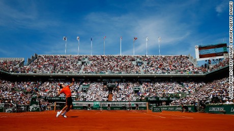 PARIS, FRANCE - JUNE 07:  Novak Djokovic of Serbia serves in the Men&#39;s Singles Final against Stanislas Wawrinka of Switzerland on day fifteen of the 2015 French Open at Roland Garros on June 7, 2015 in Paris, France.  (Photo by Julian Finney/Getty Images)