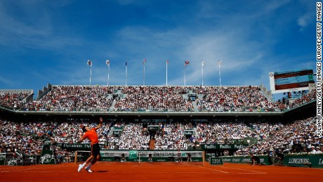 PARIS, FRANCE - JUNE 07:  Novak Djokovic of Serbia serves in the Men&#39;s Singles Final against Stanislas Wawrinka of Switzerland on day fifteen of the 2015 French Open at Roland Garros on June 7, 2015 in Paris, France.  (Photo by Julian Finney/Getty Images)