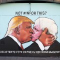 kissing mural trump johnson