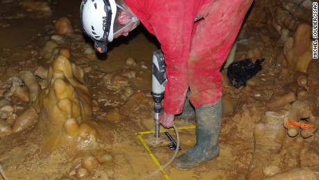 The stalagmite floor inside one of the structures of the Bruniquel Cave.