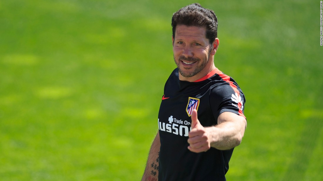 Atletico&#39;s head coach Diego Simeone gives the thumbs up during training ahead of the final. The team plays in the Argentine&#39;s image -- dogged, relentless and tenacious. Under him it broke the stranglehold of Barcelona and Real Madrid to win the Spanish League title in 2013.