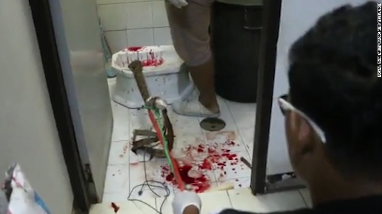 Blood is splattered across the bathroom floor where the man was bitten by the python.