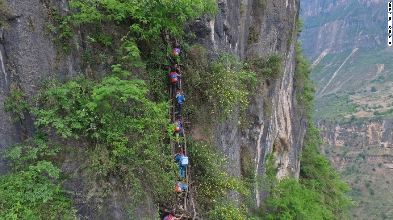 Atule'er, a village in China's Sichuan province, received widespread attention after state-run Beijing News published a series of photos of students climbing vine ladders along a 800-meter (half-mile) cliff to go to school.&lt;br /&gt;