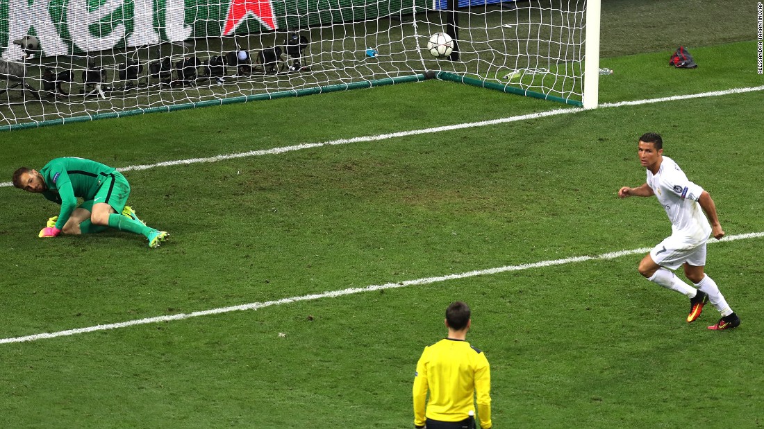 Real Madrid&#39;s Ronaldo scores the decisive penalty kick to win the Champions League final soccer match. 