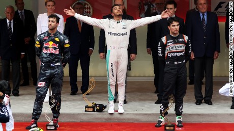 Lewis Hamilton celebrates his Monaco Grand Prix victory on the podium