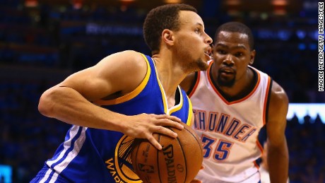 OKLAHOMA CITY, OK - MAY 28:  Stephen Curry #30 of the Golden State Warriors drives against Kevin Durant #35 of the Oklahoma City Thunder during the fourth quarter in game six of the Western Conference Finals during the 2016 NBA Playoffs at Chesapeake Energy Arena on May 28, 2016 in Oklahoma City, Oklahoma. NOTE TO USER: User expressly acknowledges and agrees that, by downloading and or using this photograph, User is consenting to the terms and conditions of the Getty Images License Agreement.  (Photo by Maddie Meyer/Getty Images)