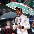 Novak Djokovic umbrella french open day 10