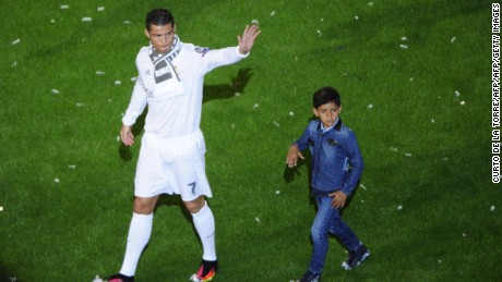 Ronaldo celebrates winning the Champions League with his son, Cristiano Jr.