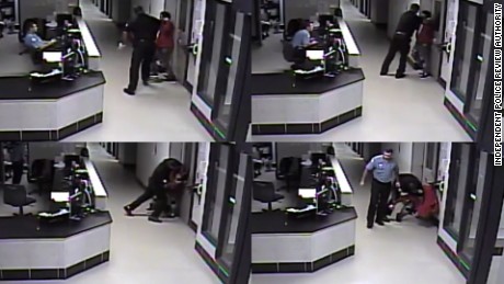 Screenshots from a video appear to show an officer grab Albert Payne&#39;s neck.