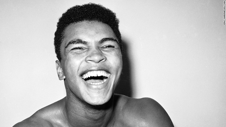 Cassius Clay is a happy young man in his dressing room after knocking out Archie Moore in the exact round he predicted he would, the fourth, at Los Angeles, Nov. 17, 1962.  (AP Photo)