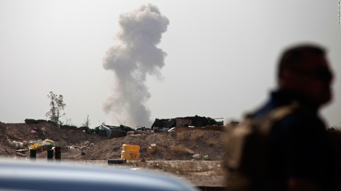 Smoke rises on the front line of fighting between ISIS militants and pro-government Iraqi fighters on Sunday, June 5.