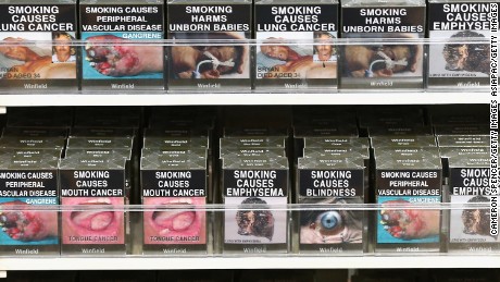 Muddy-colored cigarette packs in Australia also feature graphic health warnings. The UK has followed suit.