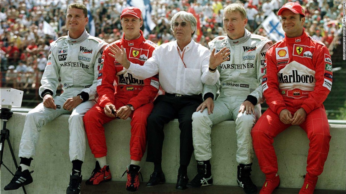 Ecclestone posing with (from L-R) David Coulthard, Michael Schumacher, Mika Hakkinen and Rubens Barrichello at the Hungarian Grand Prix in 2000. Today, the 85-year-old Briton shows no sign of slowing down. 