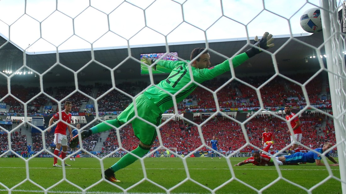 The header of Adam Nemec of Slovakia hits the goal post.