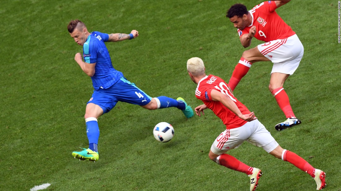 Wales forward Hal Robson-Kanu shoots to score.