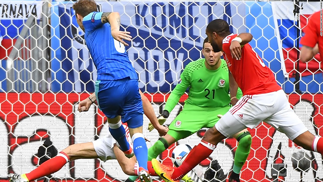 Slovakia&#39;s midfielder Ondrej Duda shoots and scores his team&#39;s first, and only, goal. Earlier this month, Slovakia defeated world champion Germany 3-1 while it also overcame Spain during the qualifying campaign.