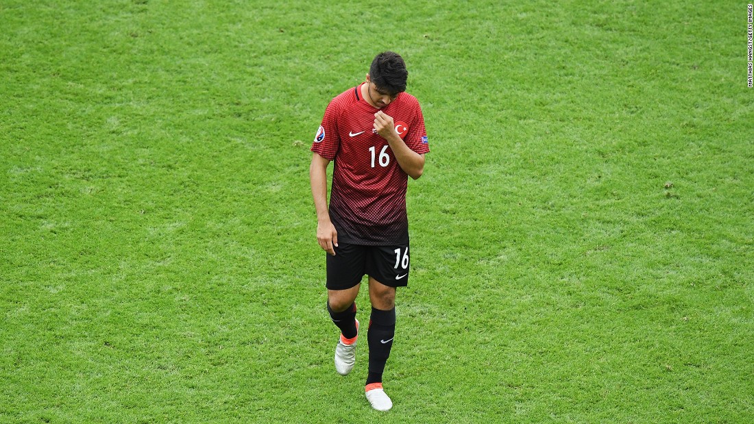 Turkey&#39;s Ozan Tufan leaves the pitch after enduring a frustrating afternoon.