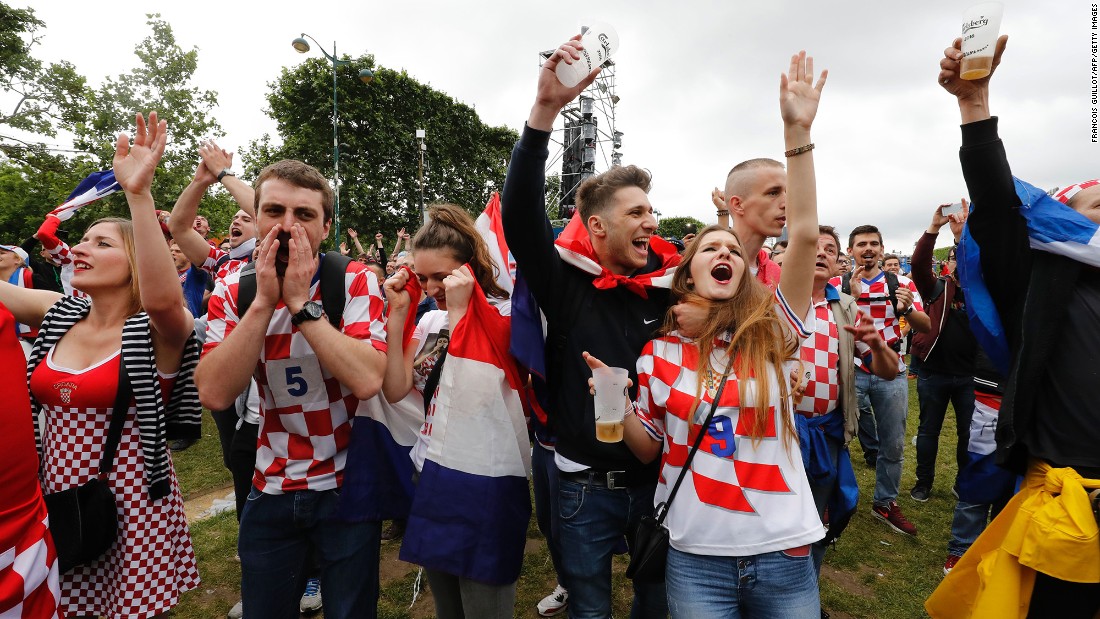 Croatian supporters in a Paris fan zone celebrate their team&#39;s victory.