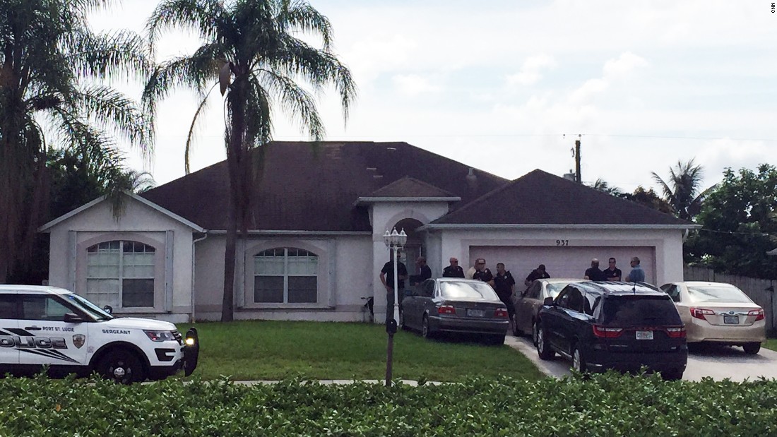 Police gather outside the home in Port St. Lucie, Florida, where Mateen&#39;s father lives.