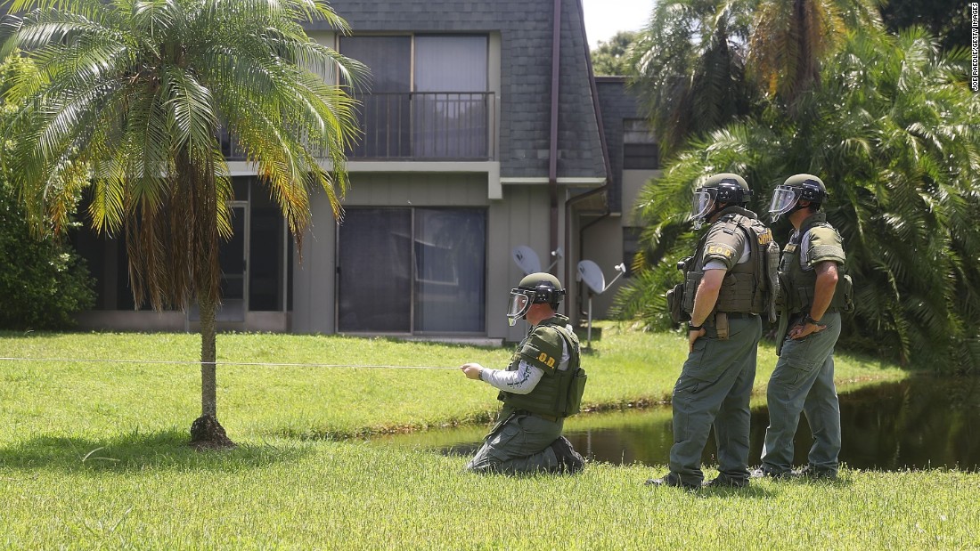 A bomb disposal unit checks for explosives around the apartment building where Mateen is believed to have lived in Fort Pierce, Florida. 