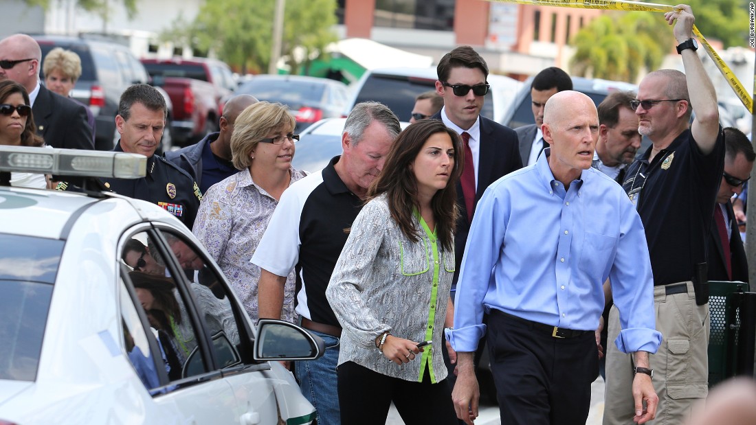 Florida Gov. Rick Scott arrives at the scene.