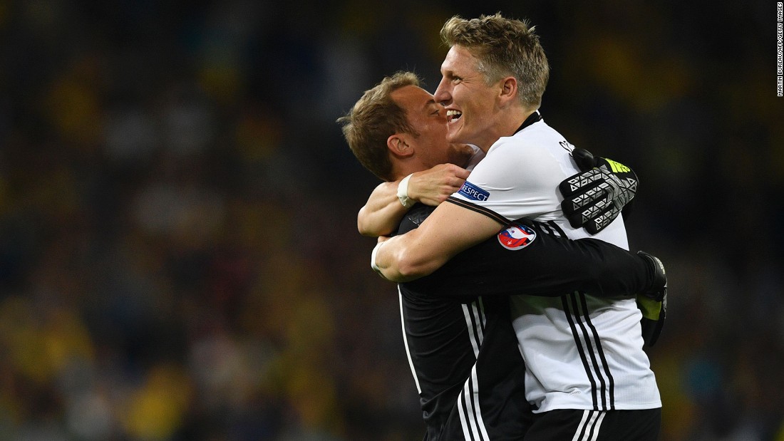 Schweinsteiger celebrates Germany&#39;s second goal with goalkeeper Manuel Neuer.