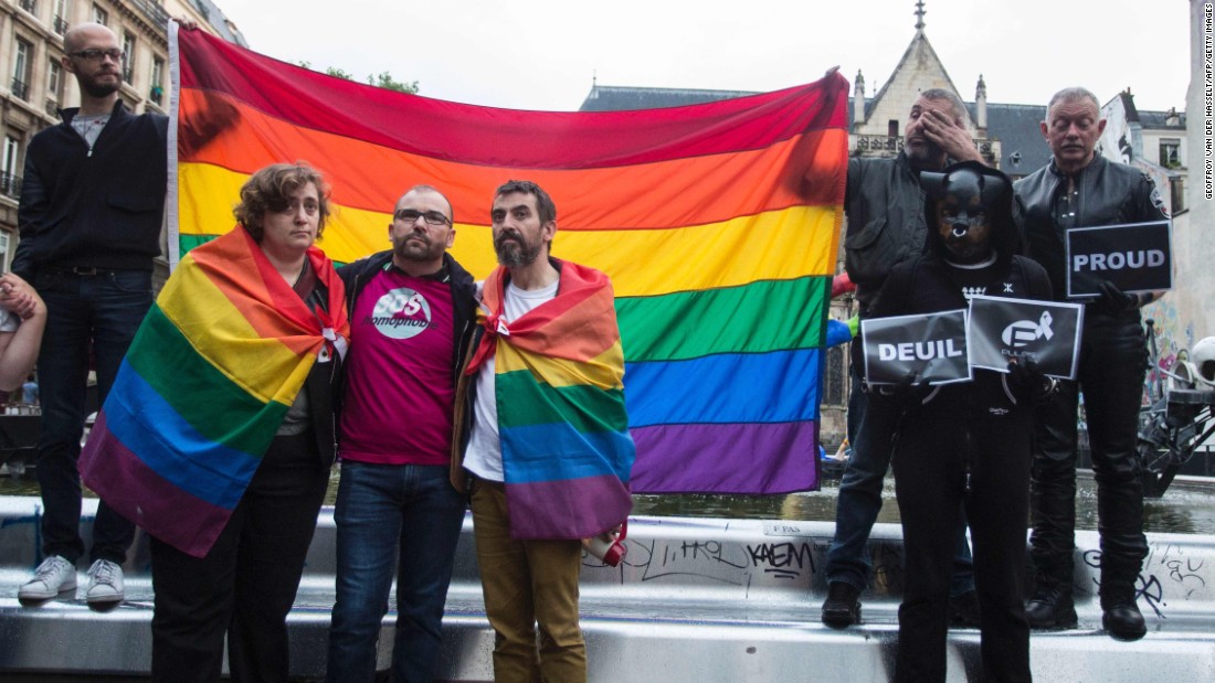 People gather for a vigil near the Beaubourg art center in Paris on June 12. 