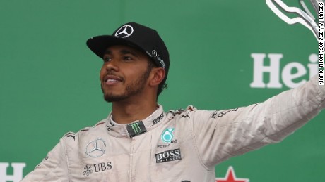 Lewis Hamilton celebrates winning the Canadian F1 Grand Prix for the fifth time. 