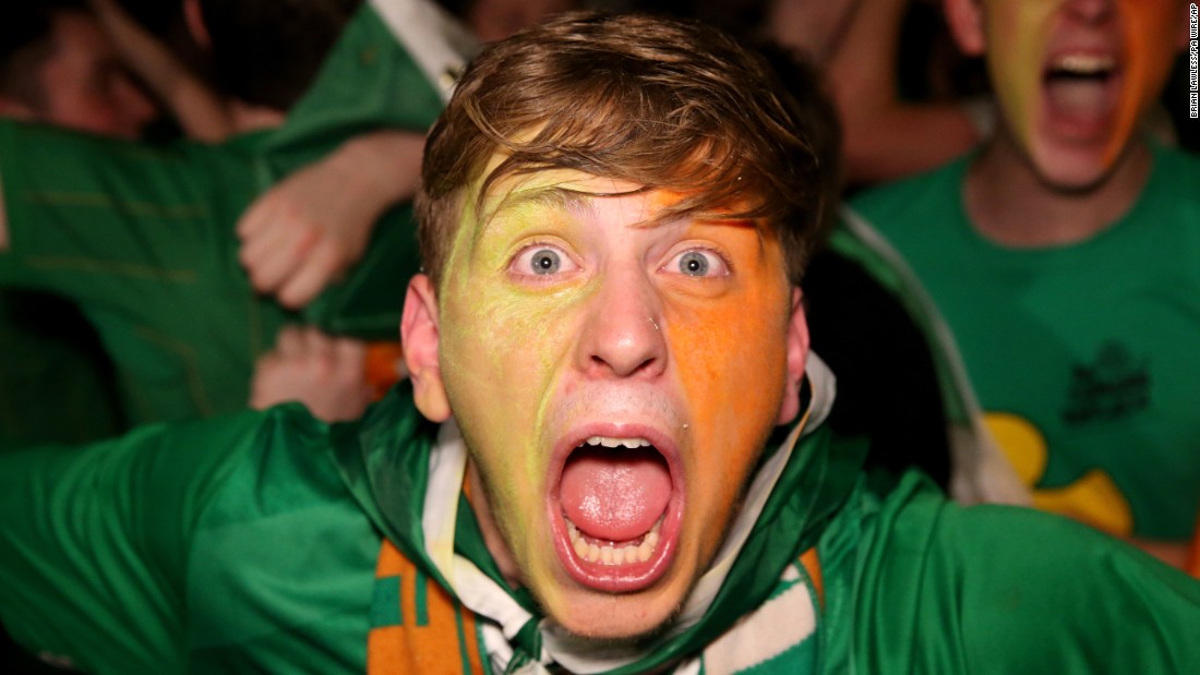 A fan enjoys the Hoolahan goal in Dublin, Ireland.