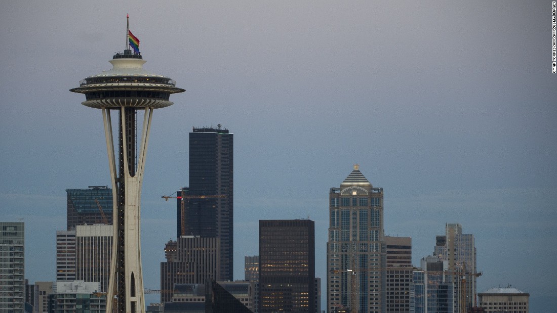 A rainbow flag flies at half-staff on the Space Needle in Seattle on June 12.