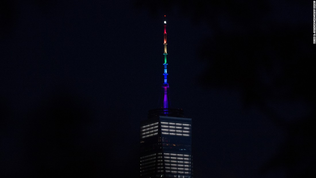 One World Trade Center is lit in rainbow colors June 12 in New York.