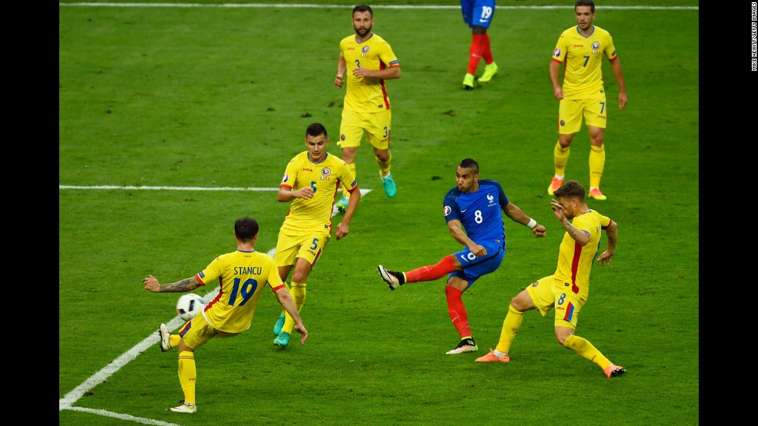Dimitri Payet unleashes a powerful shot that gave France a 2-1 victory over Romania in &lt;a href=&quot;http://www.cnn.com/2016/06/10/football/gallery/euro-football-0610/index.html&quot; target=&quot;_blank&quot;&gt;the opening match&lt;/a&gt; of Euro 2016. The match was played in the Stade de France just north of Paris on Friday, June 10. &lt;a href=&quot;http://www.cnn.com/specials/sport/football/euro2016&quot; target=&quot;_blank&quot;&gt;Full coverage of Euro 2016&lt;/a&gt;