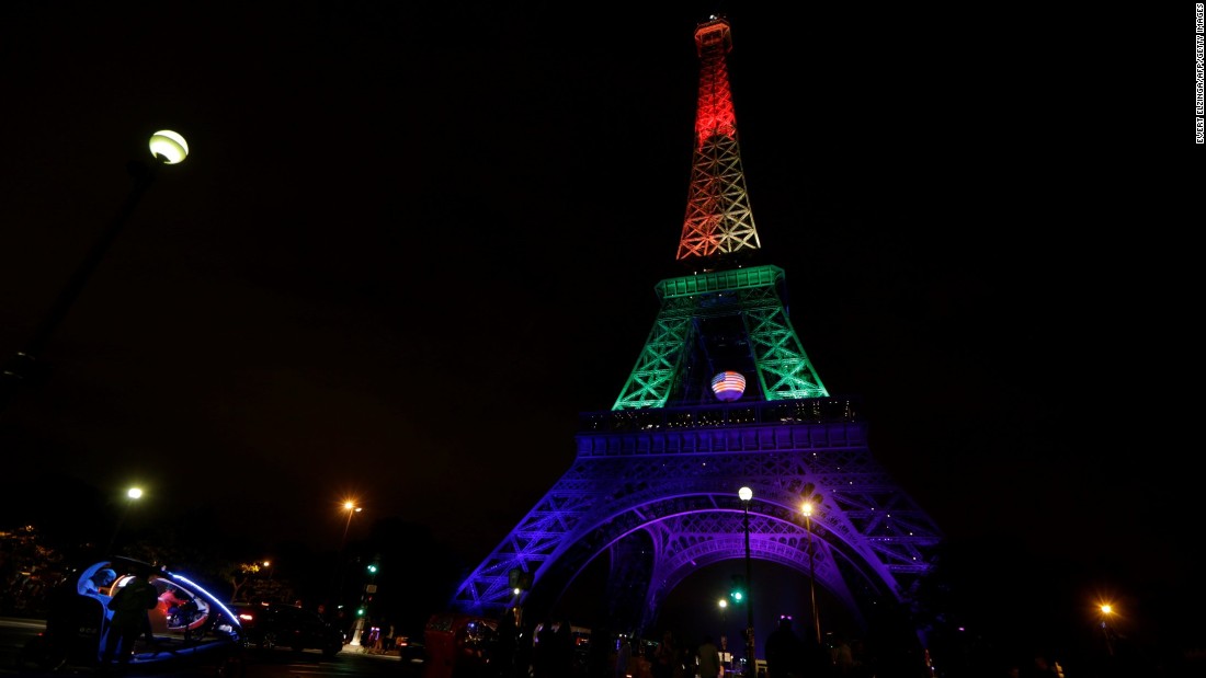 The Eiffel Tower in Paris is illuminated in rainbow colors on June 13.