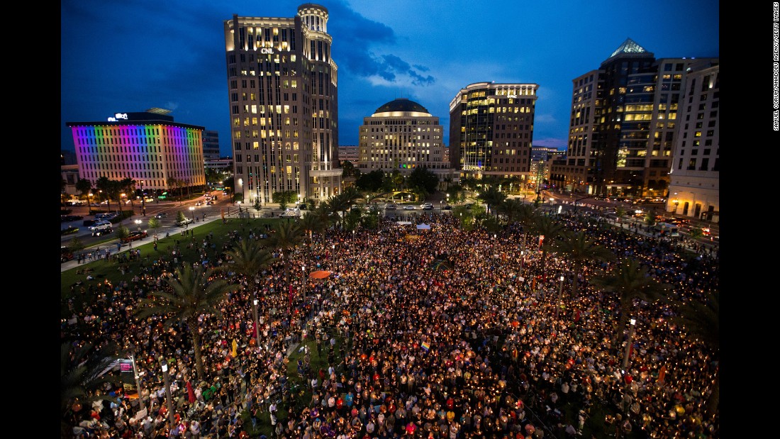 Thousands gather in Orlando on Monday, June 13, to pay tribute to those who were killed the day before.