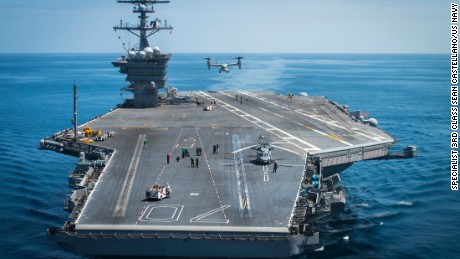 160612-N-BL637-685 PACIFIC OCEAN (June 12, 2016) A MV-22B Osprey, from Marine Operational Test and Evaluation Squadron 1, lifts off from the flight deck of the aircraft carrier USS Carl Vinson (CVN 70). The V-22 Osprey is being tested, evaluated and is slated to be planned replacement for the C-2Q Greyhound as the singular logistics platform on an aircraft carrier for future carrier on-board delivery operations. (U.S. Navy photo by Mass Communication Specialist 3rd Class Sean Castellano/Released)