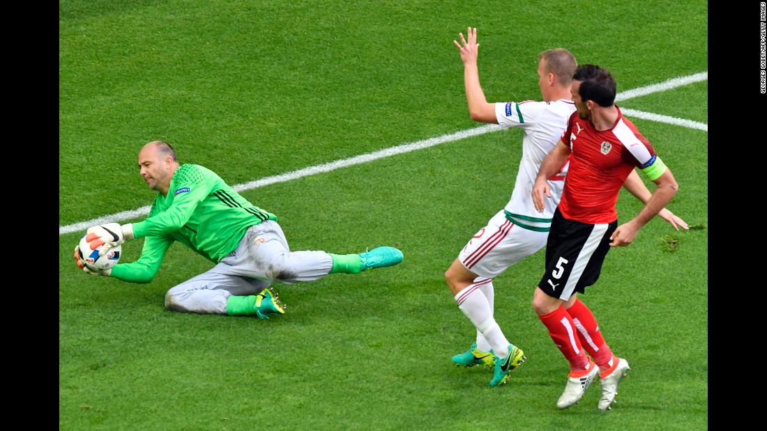 Hungary goalkeeper Gabor Kiraly makes a save. The 40-year-old is now the oldest player ever to compete in the Euros.