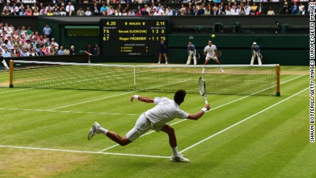 LONDON, ENGLAND - JULY 12:  Novak Djokovic of Serbia plays a forehand in the Final Of The Gentlemen&#39;s Singles against Roger Federer of Switzerland on day thirteen of the Wimbledon Lawn Tennis Championships at the All England Lawn Tennis and Croquet Club on July 12, 2015 in London, England.  (Photo by Shaun Botterill/Getty Images)