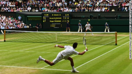 LONDON, ENGLAND - JULY 12:  Novak Djokovic of Serbia plays a forehand in the Final Of The Gentlemen&#39;s Singles against Roger Federer of Switzerland on day thirteen of the Wimbledon Lawn Tennis Championships at the All England Lawn Tennis and Croquet Club on July 12, 2015 in London, England.  (Photo by Shaun Botterill/Getty Images)