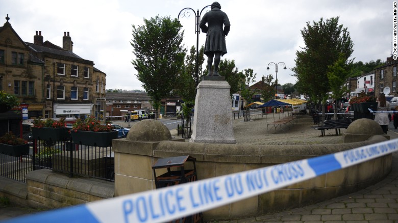 Police tape covers the area in Birstall where Labour MP Jo Cox was shot on June 16, 2016.
Campaigning for Britain&#39;s EU referendum next week was suspended on Thursday following news a leading MP with the &quot;Remain&quot; camp was in a critical condition after being shot.
Jo Cox, a 41-year-old mother-of-two from the opposition Labour Party, was left bleeding on the pavement after the incident in the town of Birstall in northern England, according to witnesses quoted by local media.
 / AFP / OLI SCARFF        (Photo credit should read OLI SCARFF/AFP/Getty Images)