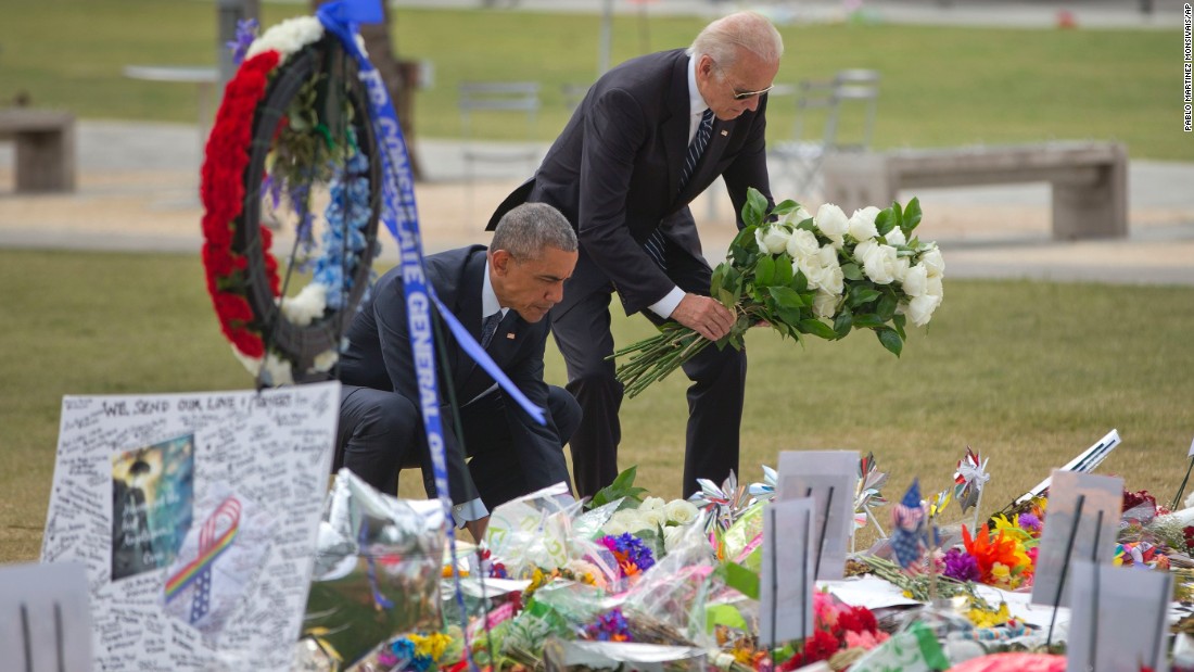 U.S. President Barack Obama and Vice President Joe Biden place flowers at a memorial Thursday, June 16, for the victims of the nightclub shooting in Orlando. At least 49 people &lt;a href=&quot;http://www.cnn.com/2016/06/12/us/gallery/orlando-shooting/index.html&quot; target=&quot;_blank&quot;&gt;were killed in the massacre,&lt;/a&gt; the deadliest mass shooting in U.S. history.