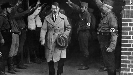 Hitler, then leader of the National Socialists, leaves the party&#39;s Munich headquarters in December 1931.