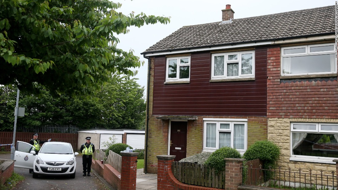 Police search Mair&#39;s home in Birstall on June 17.