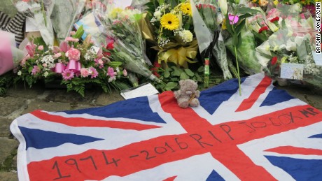 In Jo Cox&#39;s town: Market stalls, a quiet library and now flowers after an unthinkable crime 