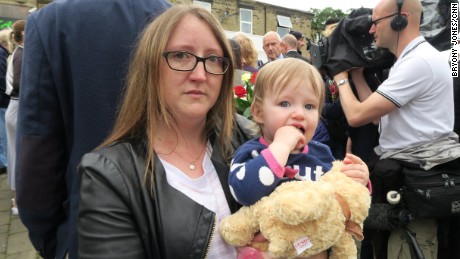 Laura Woodbridge and her daughter Lyla came to leave flowers at the makeshift memorial to Jo Cox.